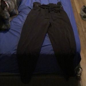 Flowy Black trousers with a ribbon belt attached